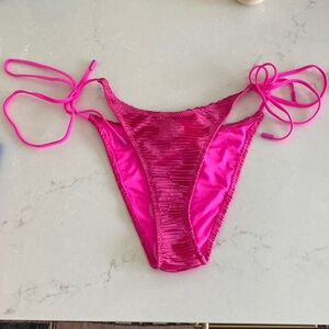 Hot pink Triangl bottoms.